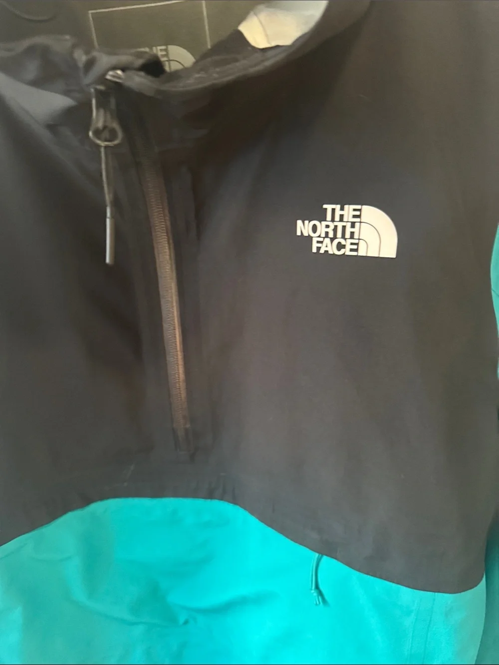 The North Face Men's Two-Tone Hooded Anorak Rain Jacket in Teal and Black